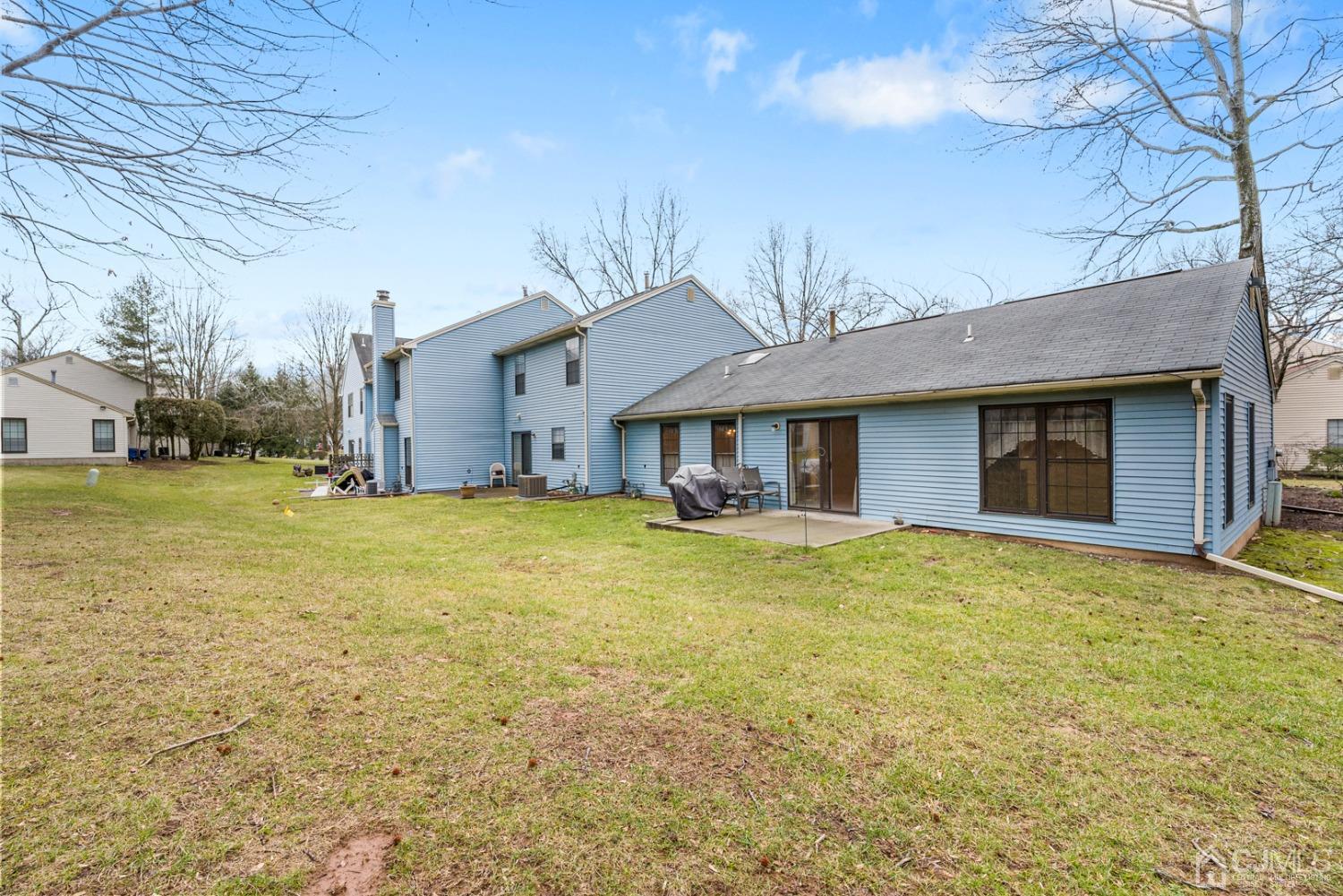 1801 Timber Oaks Road Edison, NJ 08820 - Photo 26 of 35 a front view of a house with a garden