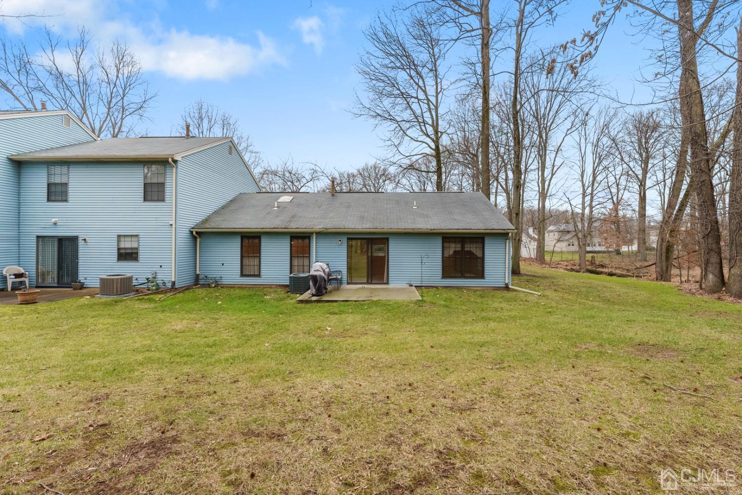 1801 Timber Oaks Road Edison, NJ 08820 - Photo 27 of 35 a front view of a house with a garden