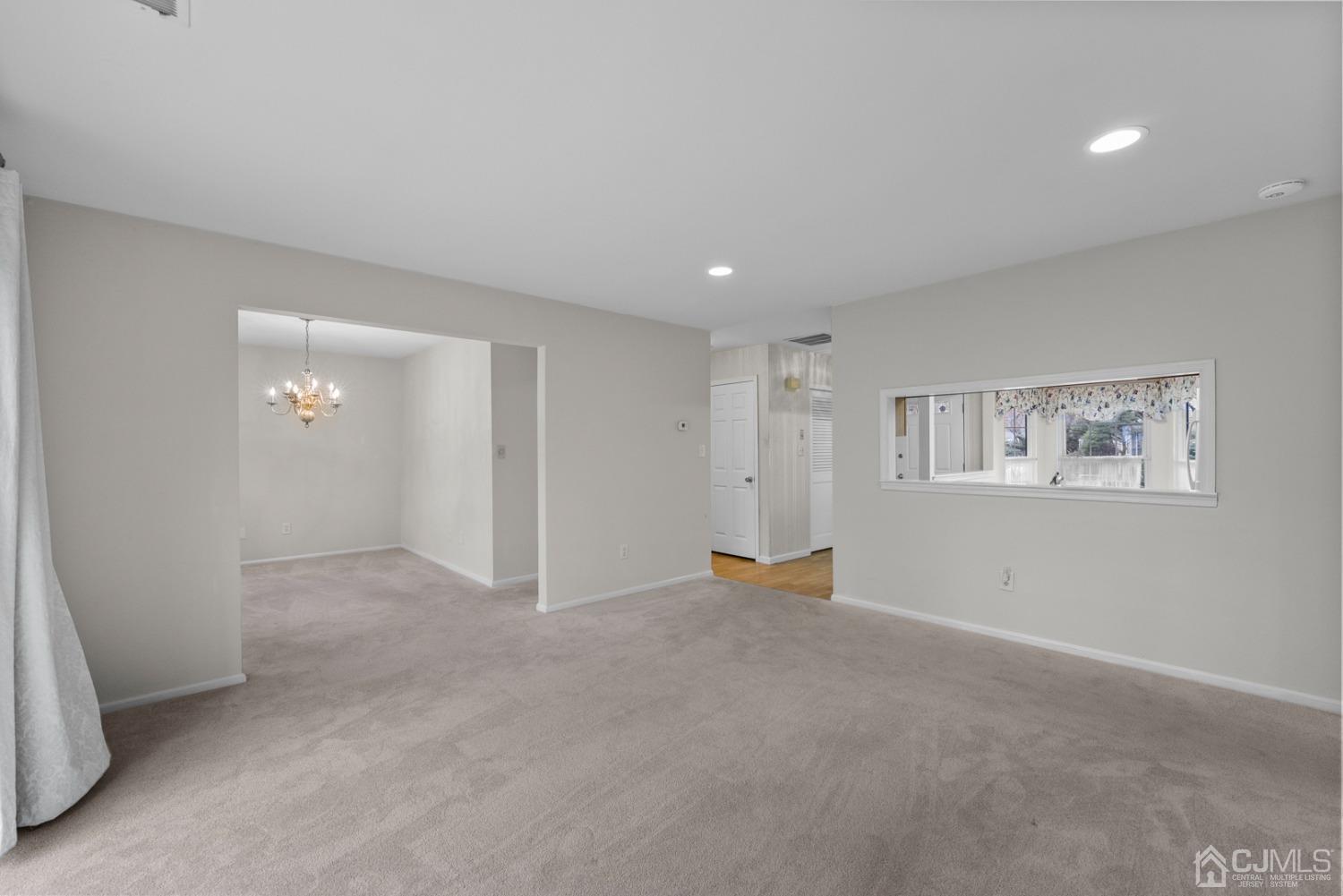 1801 Timber Oaks Road Edison, NJ 08820 - Photo 10 of 35 an empty room with windows