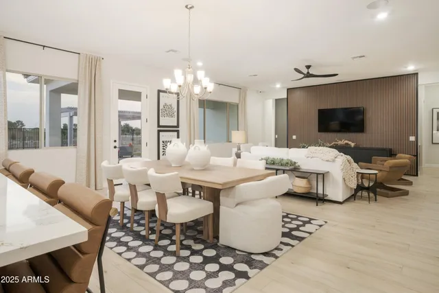 a bathroom with a toilet and a mirror