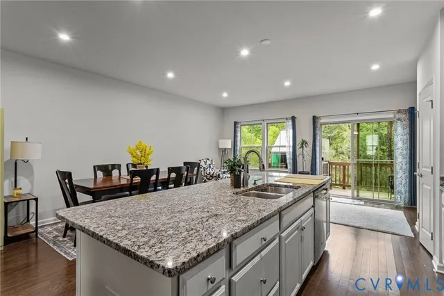 a kitchen with granite countertop sink and counter top space