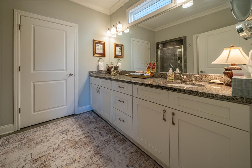 32 Encore Lane Cartersville, GA 30120 - Photo 15 of 28 a bathroom with a sink and a mirror