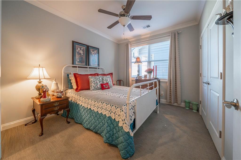 32 Encore Lane Cartersville, GA 30120 - Photo 18 of 28 a bed room with a bed and a window