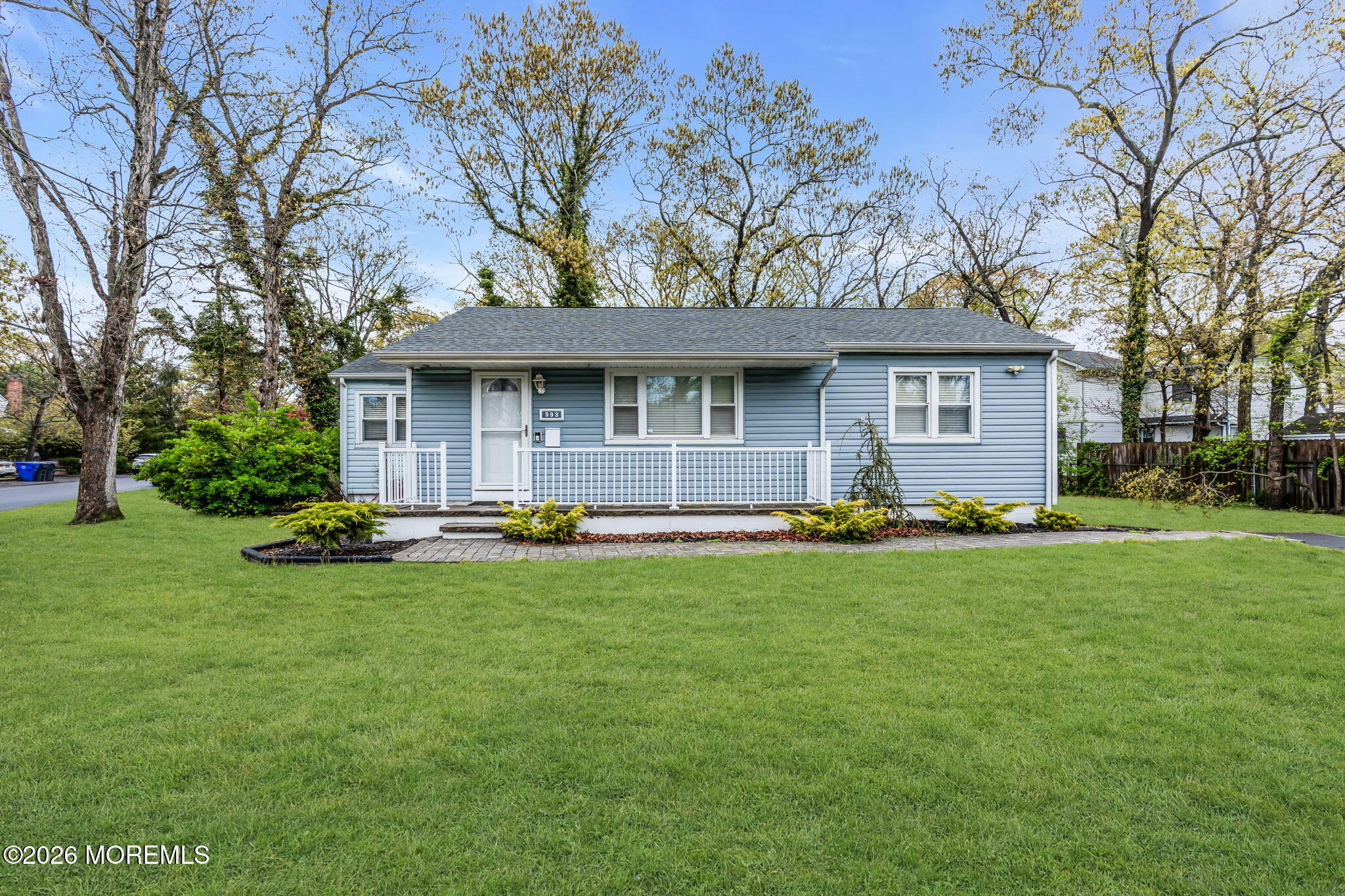 593 Beach Plum Road Brick, NJ 08723 - Photo 5 of 38 a front view of house with yard and outdoor seating