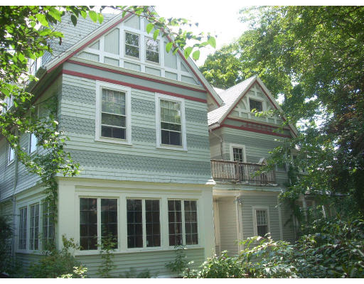 310 Pine Street Springfield, MA 01105 - Photo 3 of 6 a view of a house with a yard and plants