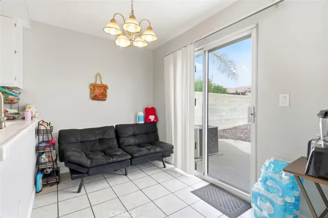a white toilet sitting next to a sink