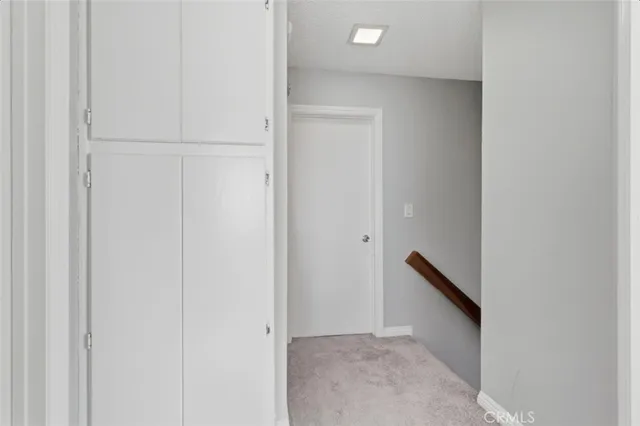 a room with a bed and window