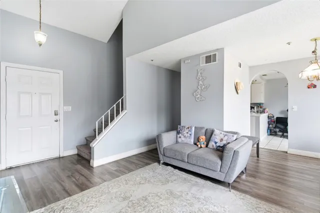 a living room with furniture and a window