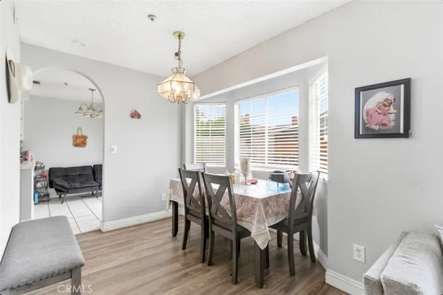 a kitchen with stainless steel appliances a refrigerator sink and cabinets