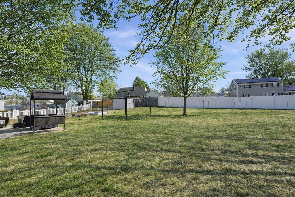 34 Beaconsfield Street Lawrence, MA 01843 - Photo 27 of 29 a view of a backyard with a garden