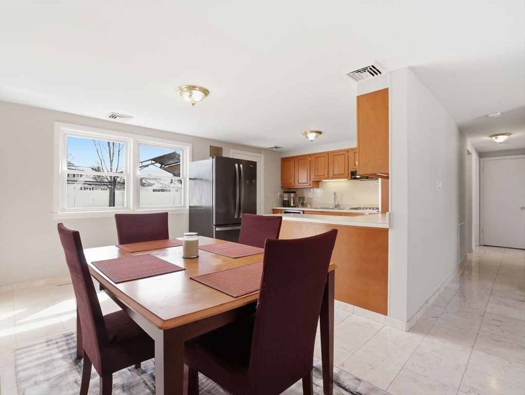 34 Beaconsfield Street Lawrence, MA 01843 - Photo 8 of 29 a view of a dining room with furniture