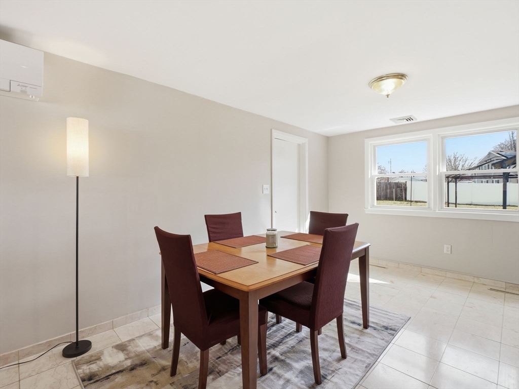 34 Beaconsfield Street Lawrence, MA 01843 - Photo 9 of 29 a view of a dining room with furniture