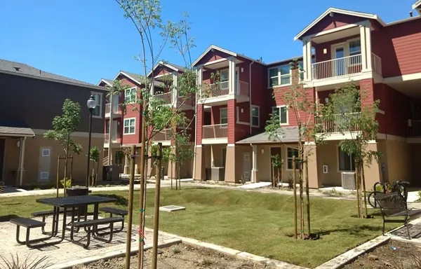 a front view of a building with swimming pool