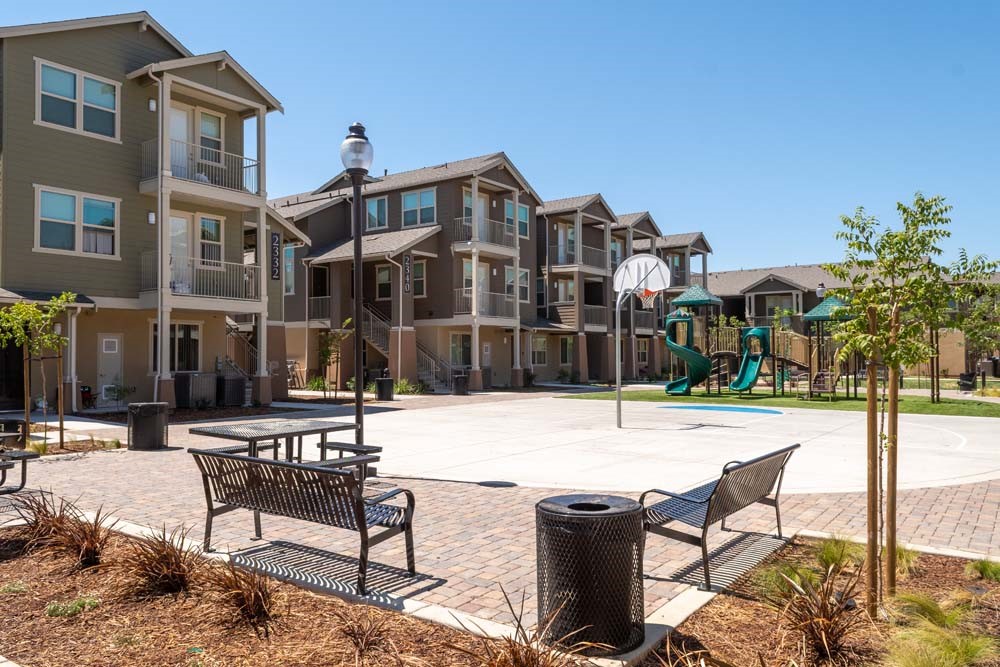 2300 Loveridge Road Pittsburg, CA 94565 - Photo 2 of 14 a view of a building with a swimming pool and sitting area