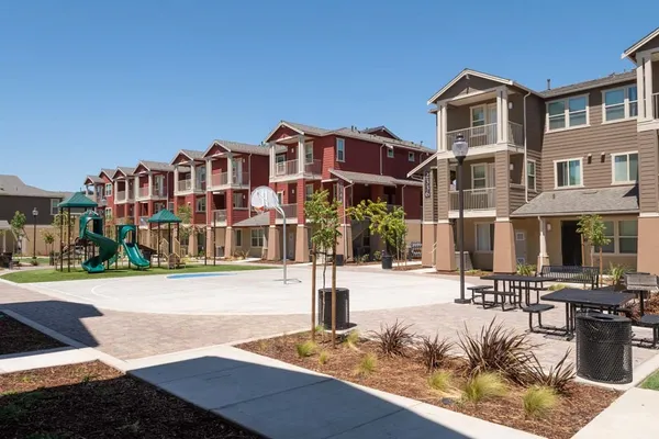 a front view of a building with street view