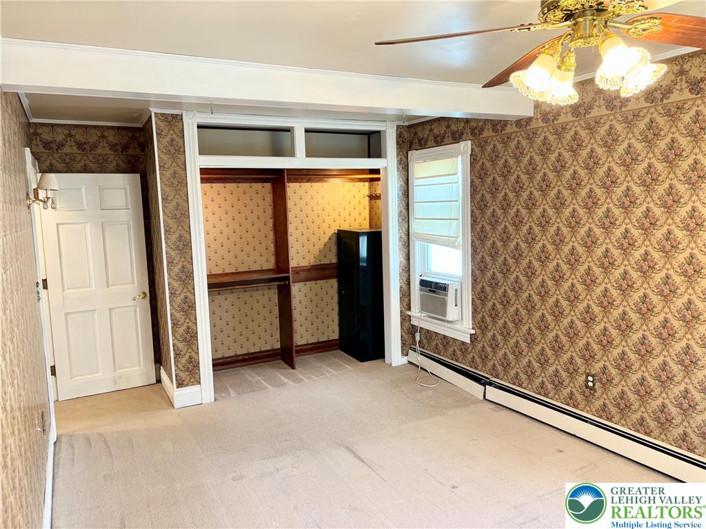 7241 Decatur Street New Tripoli, PA 18066 - Photo 17 of 36 A comfortable bedroom with a built-in closet, ready for personalized touches.