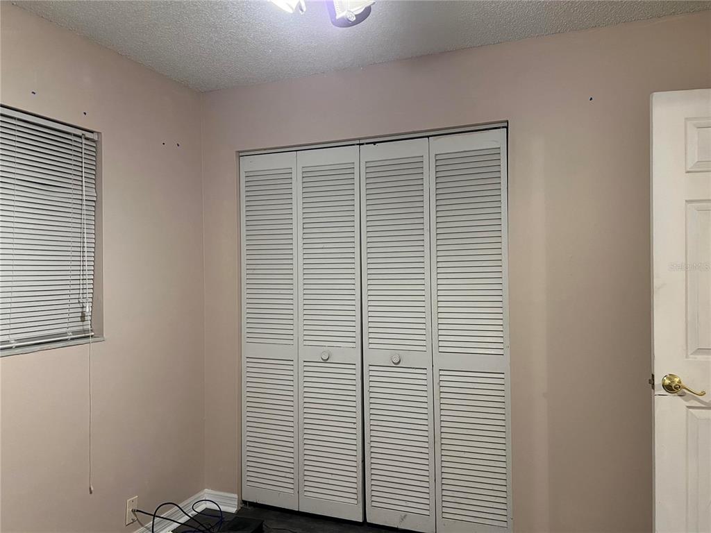 5411 Myrica Road Orlando, FL 32810 - Photo 22 of 26 a view of a bathroom with a window