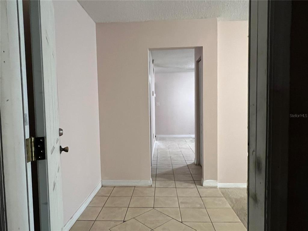 5411 Myrica Road Orlando, FL 32810 - Photo 3 of 26 a view of an empty room and closet
