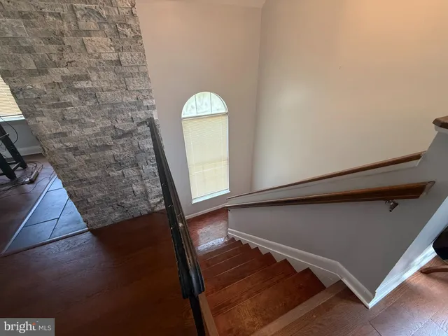 a side view of a house with a garage