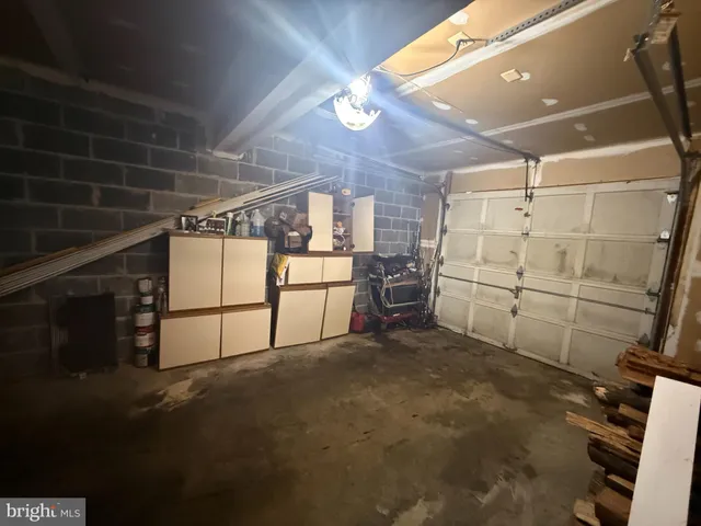 a view of a car parked in front of a house