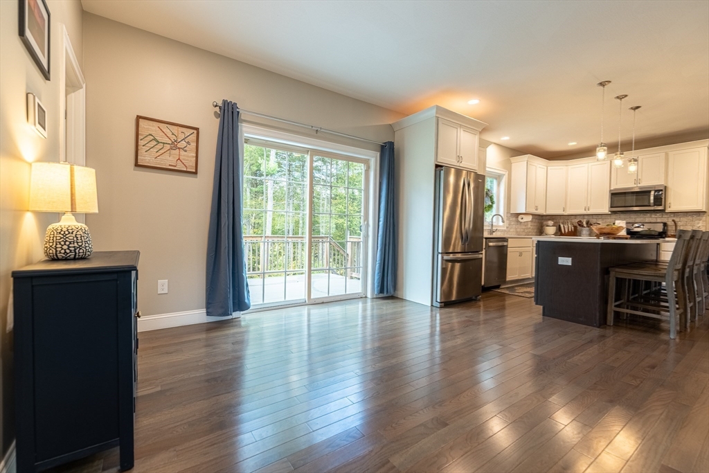 14 Whitin Heights Douglas, MA 01516 - Photo 15 of 42 a view of a kitchen with furniture stainless steel appliances and wooden floor