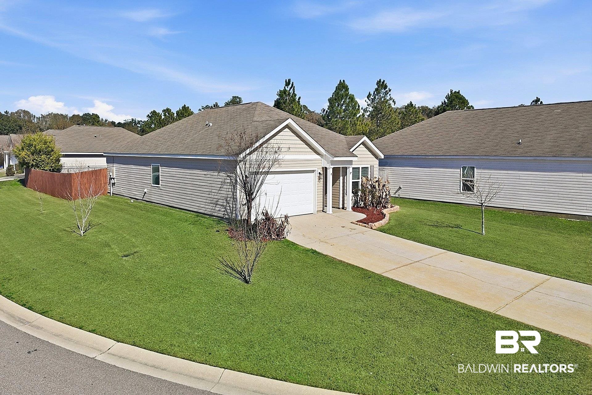 983 Summerton Drive Foley, AL 36535 - Photo 7 of 25 Ranch-style home with driveway, roof with shingles, and a garage
