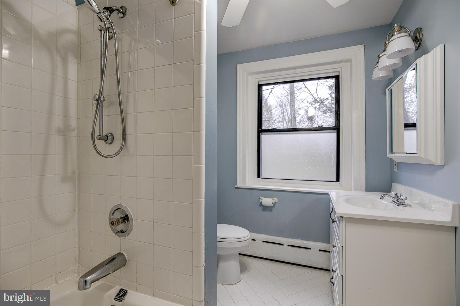 731 Yale Avenue Swarthmore, PA 19081 - Photo 26 of 41 Hall Bath, tiled floor, tub shower