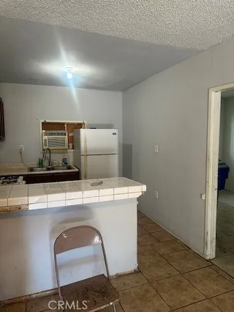 a utility room with washer and dryer