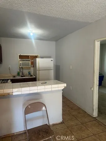 a view of a house with a patio