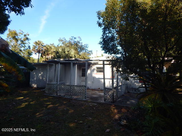 9790 Hogan Road Jacksonville, FL 32246 - Photo 11 of 11 a view of house with outdoor space