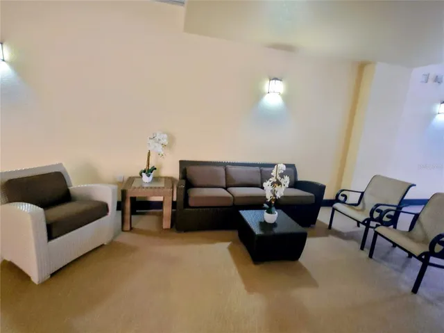 a living room with furniture and a couch