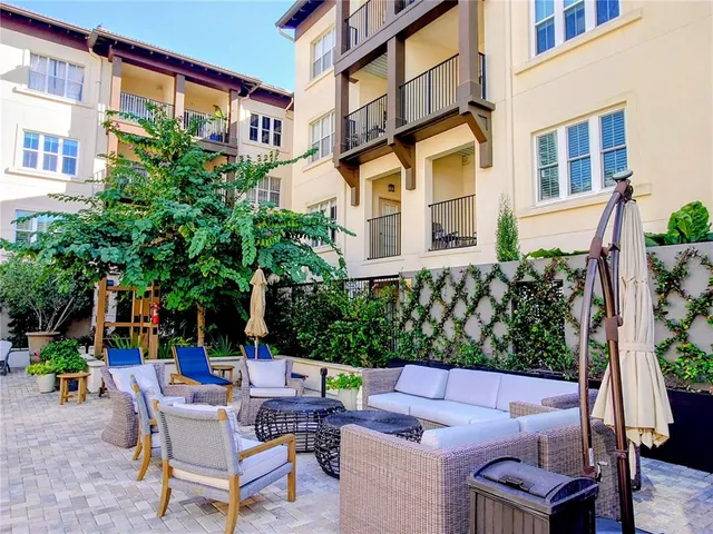 front view of a building with a garden