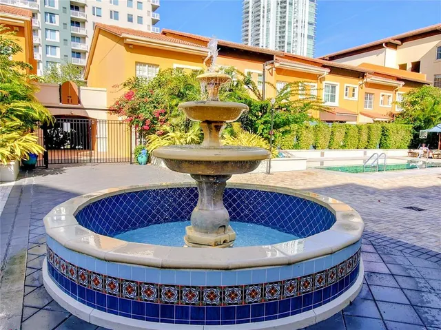 a view of outdoor sitting space with furniture