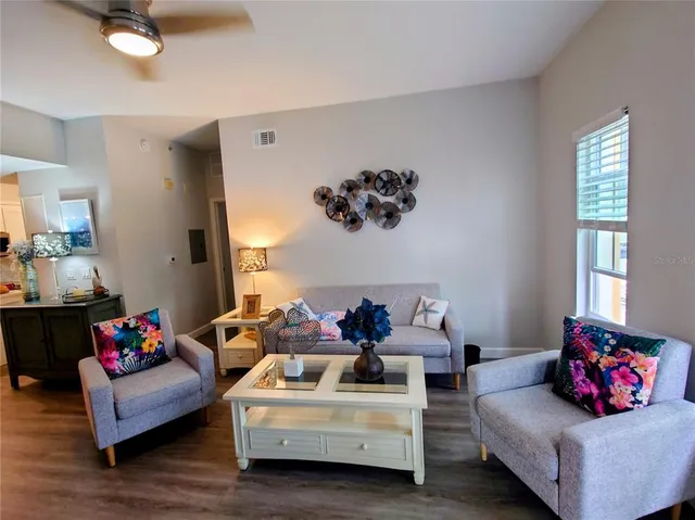 a living room with furniture and a couch