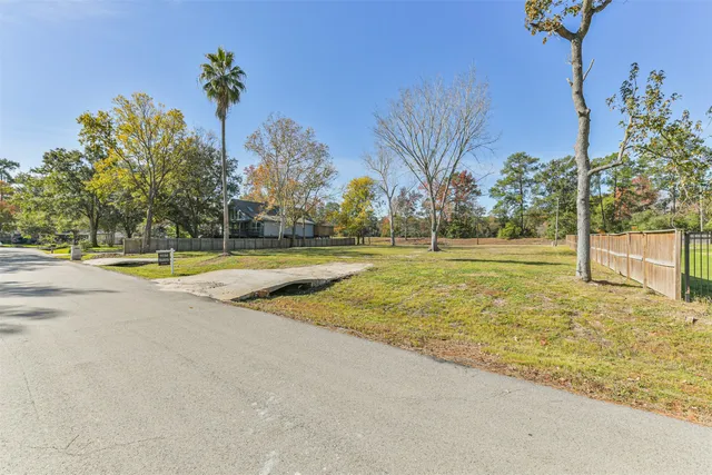 a view of a playground with basketball court