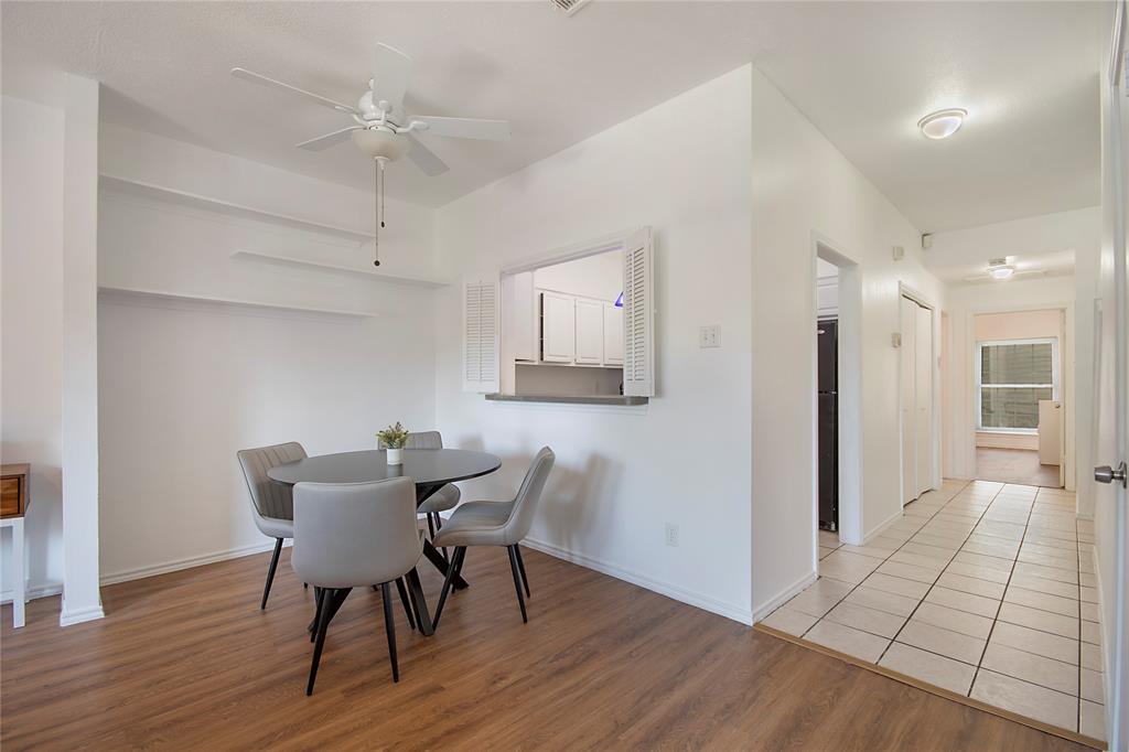 14277 Preston Road, Unit 823 Dallas, TX 75254 - Photo 14 of 31 Dining area with wood-finish flooring and a ceiling fan