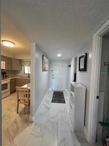a dining table with a chandelier