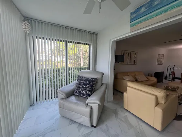 a kitchen with stainless steel appliances kitchen island sink refrigerator and stove