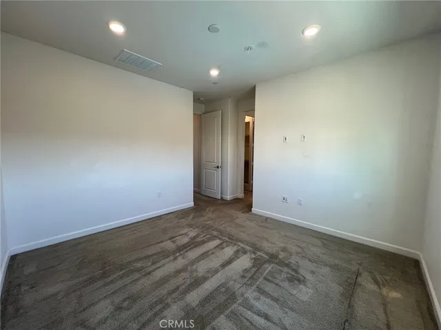 an empty room with an entryway