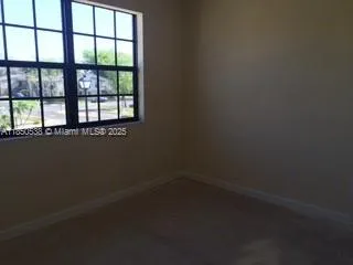 an empty room with an entryway