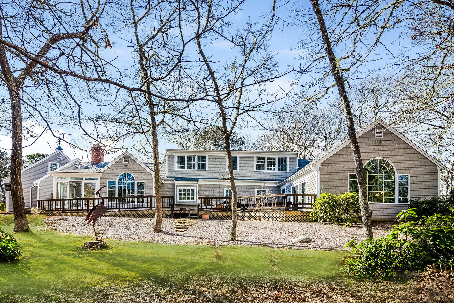 21 Marshview Lane Brewster, MA 02631 - Photo 30 of 37 a house view with a sitting space and garden