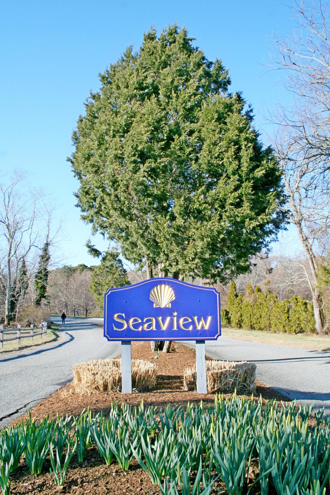 21 Marshview Lane Brewster, MA 02631 - Photo 32 of 37 a view of a bench in front of a building