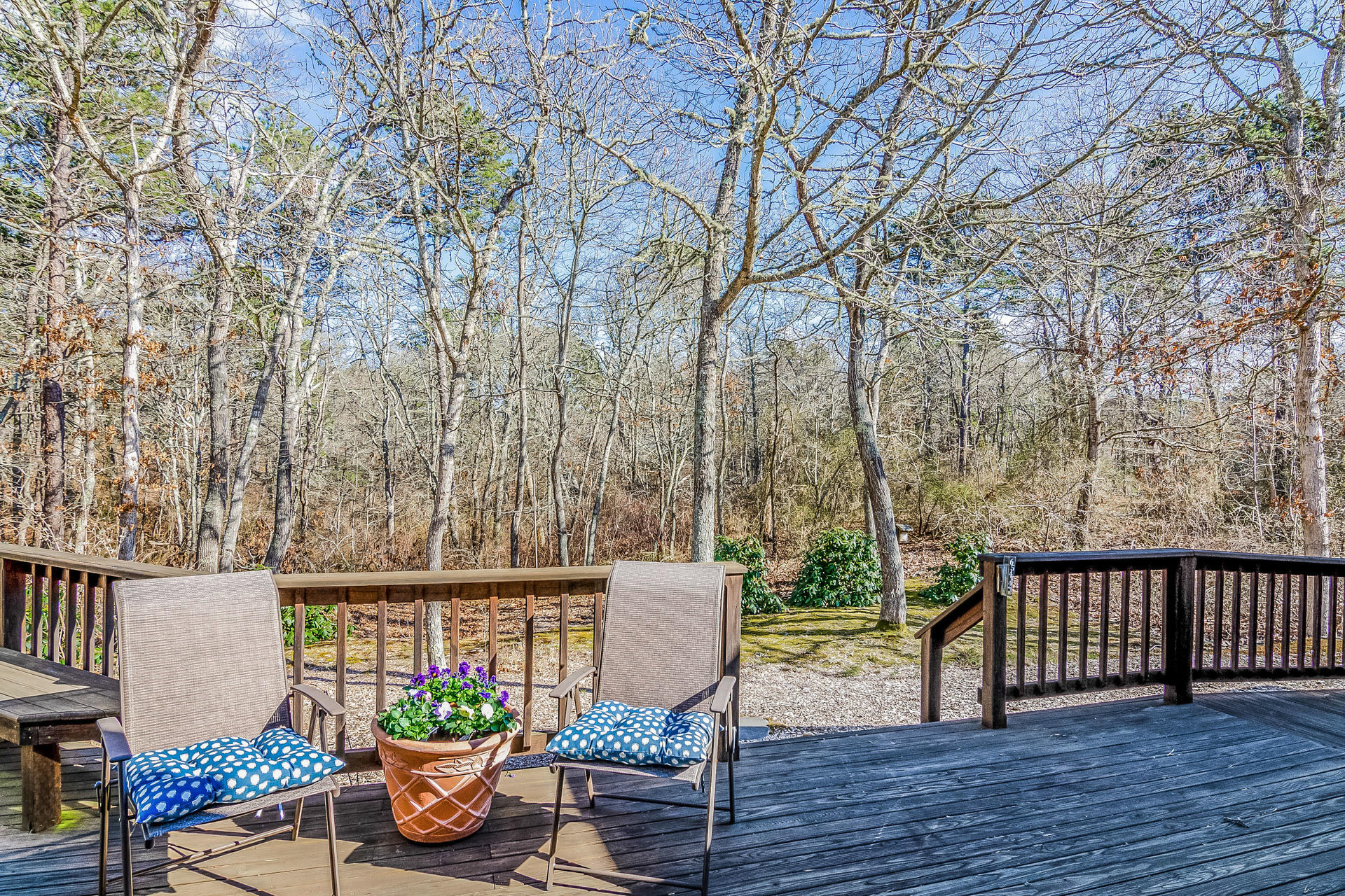 21 Marshview Lane Brewster, MA 02631 - Photo 9 of 37 a view of a deck with chair and wooden floor