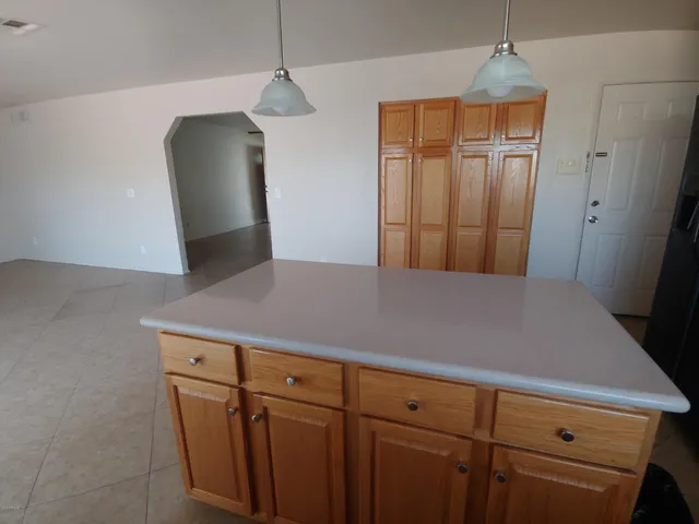 a view of a hallway with closet