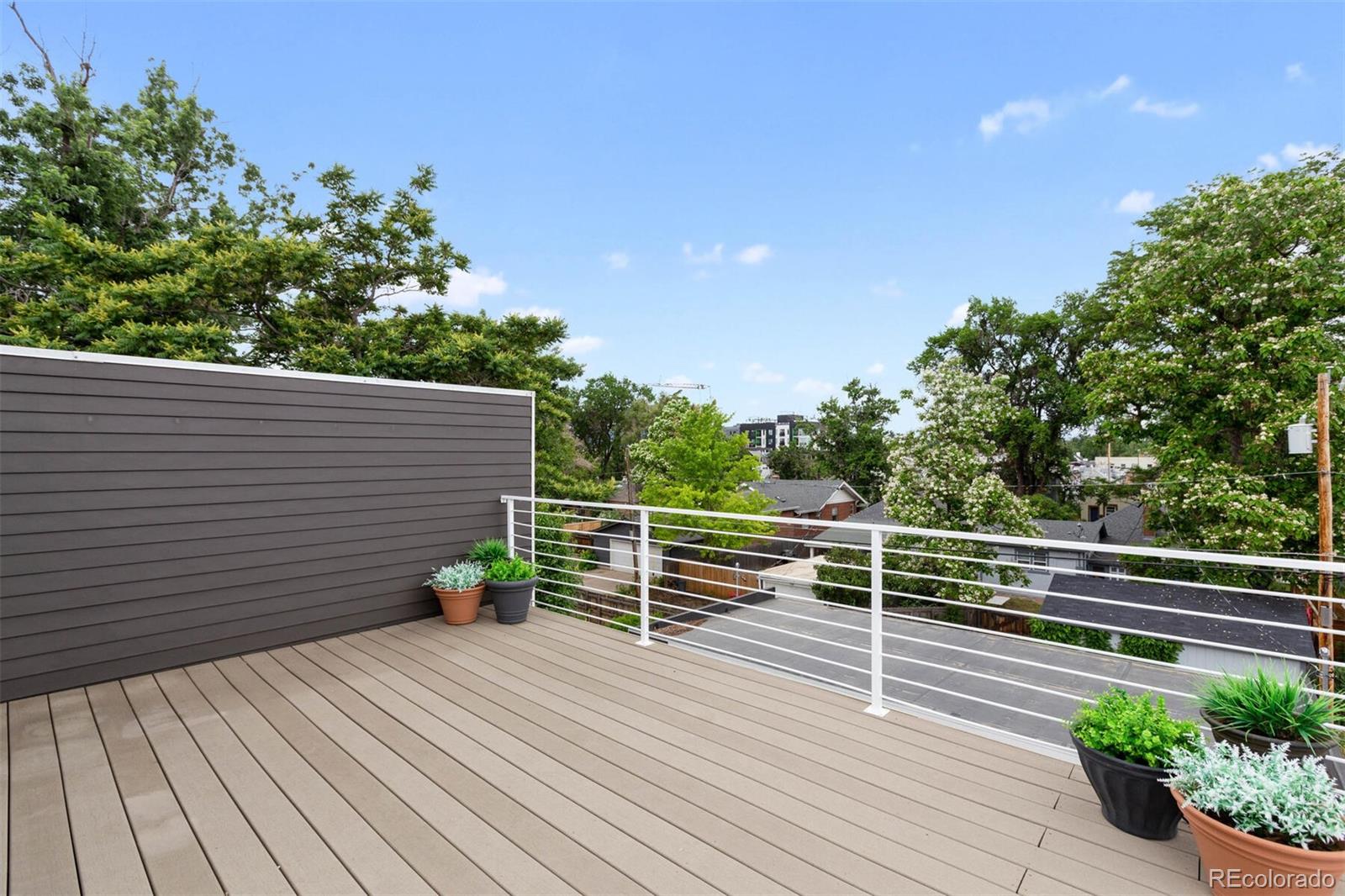4011 Raleigh Street Denver, CO 80212 - Photo 27 of 34 a view of outdoor space with deck and garden