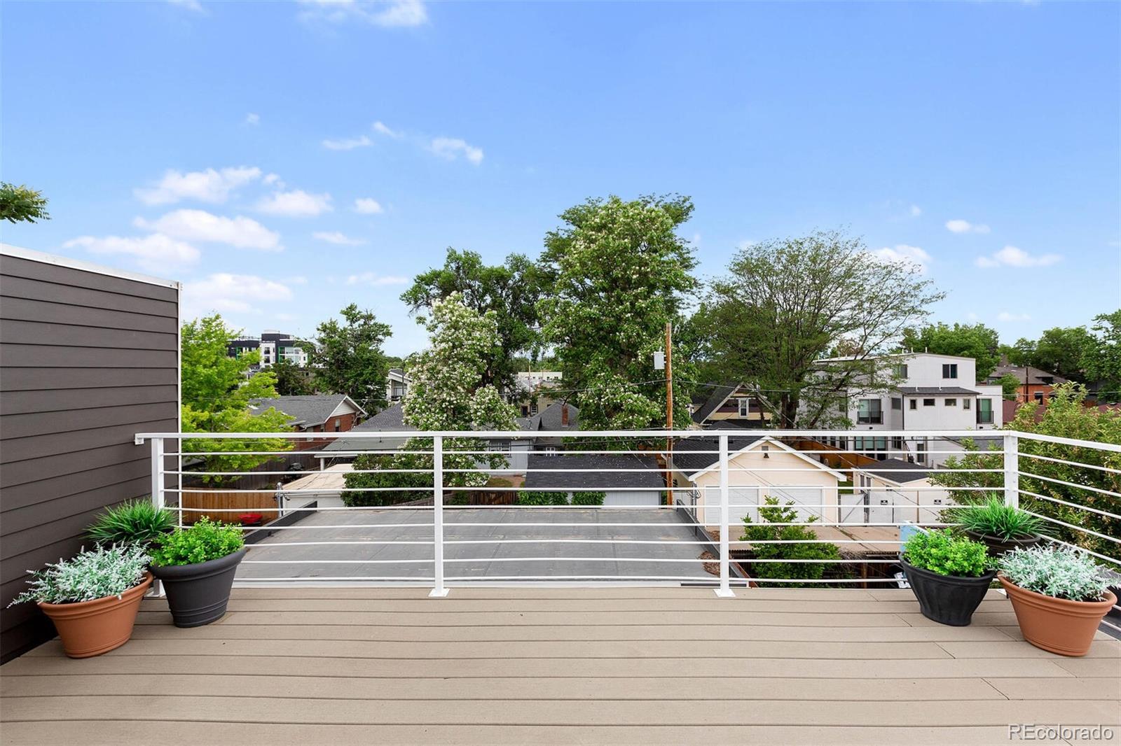 4011 Raleigh Street Denver, CO 80212 - Photo 28 of 34 a view of a terrace with couches