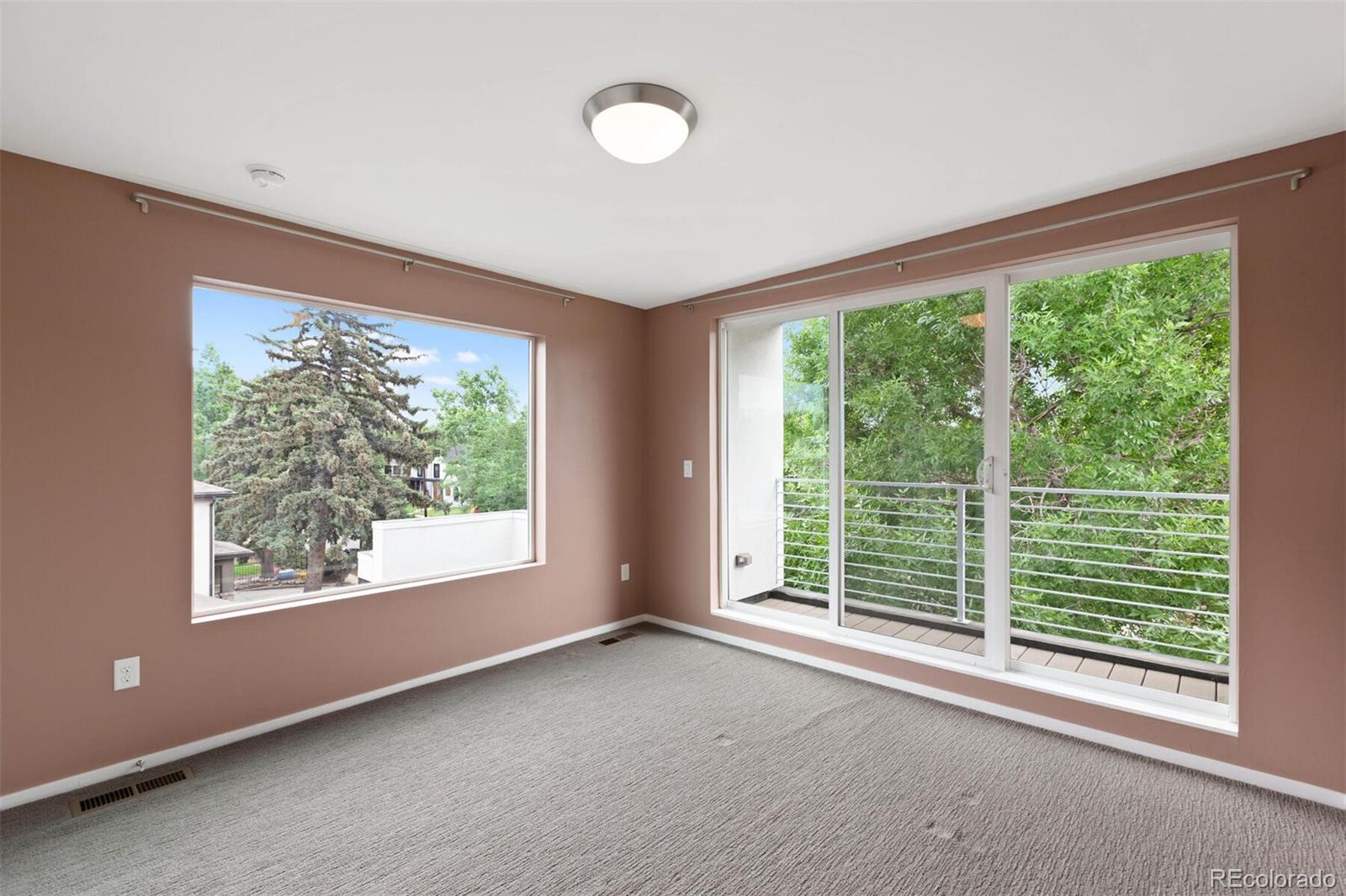 4011 Raleigh Street Denver, CO 80212 - Photo 30 of 34 a view of a room with large windows