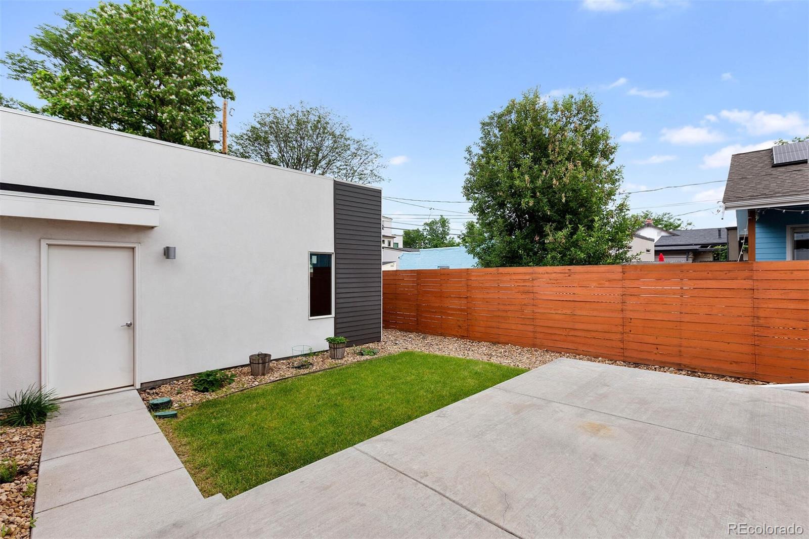 4011 Raleigh Street Denver, CO 80212 - Photo 31 of 34 a backyard of a house with lots of green space