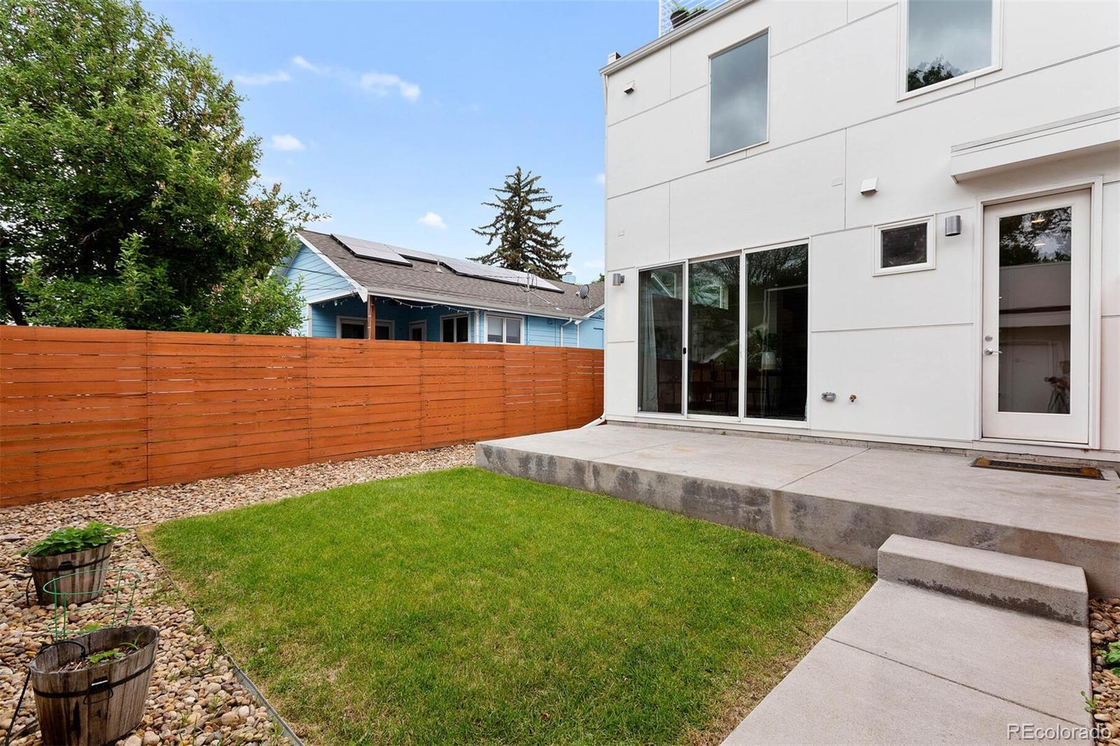 4011 Raleigh Street Denver, CO 80212 - Photo 32 of 34 a view of a backyard with a garden