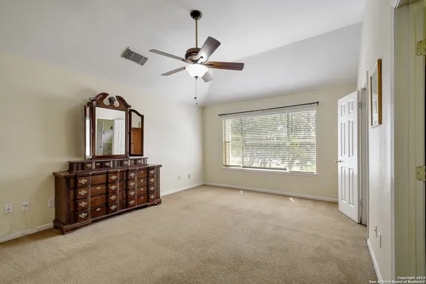 a view of workspace with furniture and window